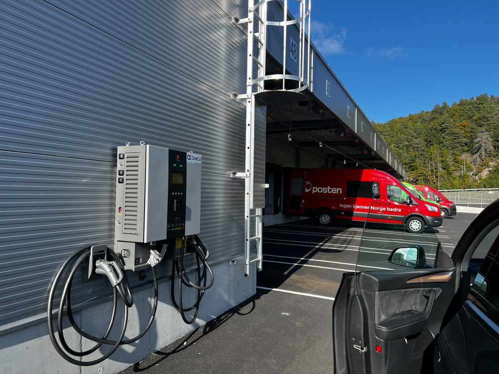 A wider view of charging equipment, vehicle bays and depot access.