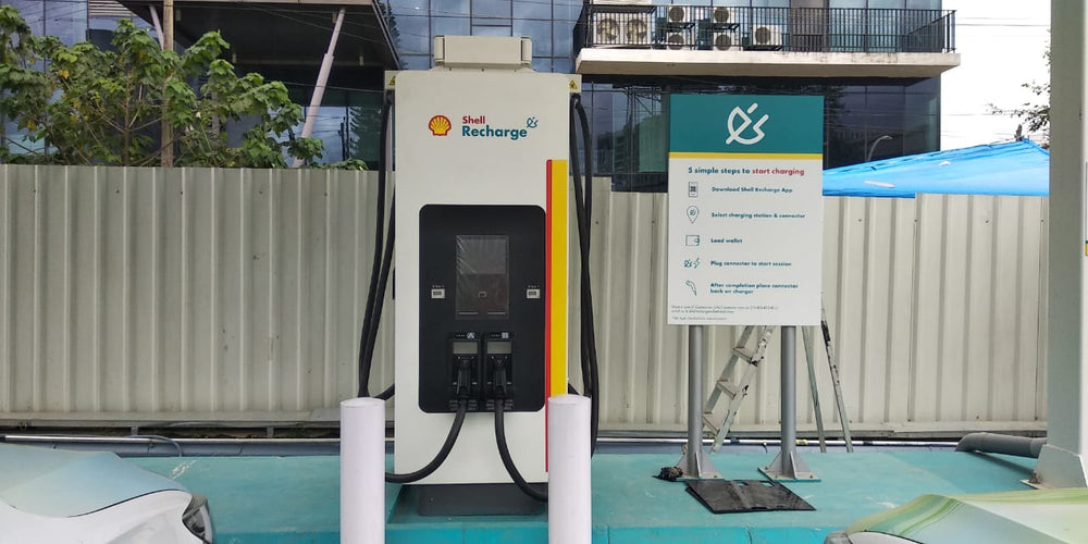 A close view of the charging equipment and dedicated bay signage.