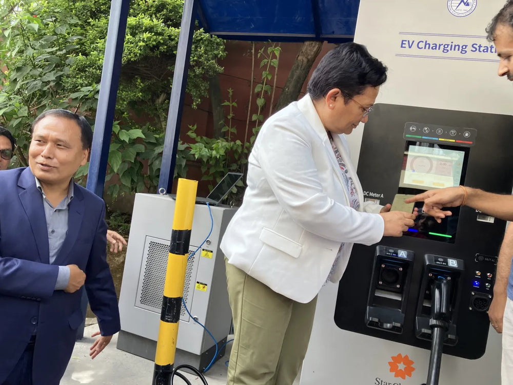Visitors using the charging equipment during an on-site activity.