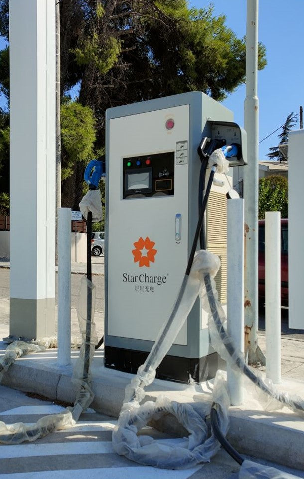 An outdoor charging unit with its connectors and cable arrangement.