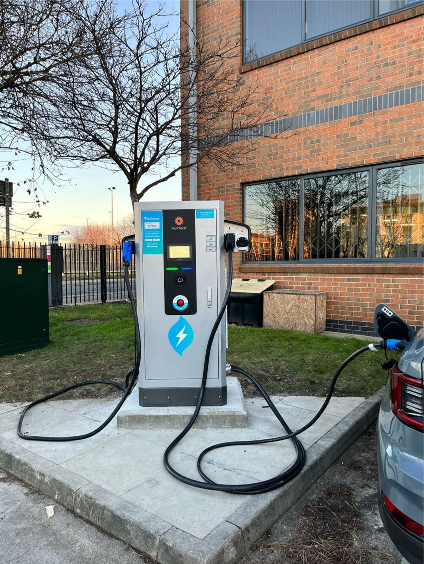 EV charging station at an outdoor parking area in the United Kingdom